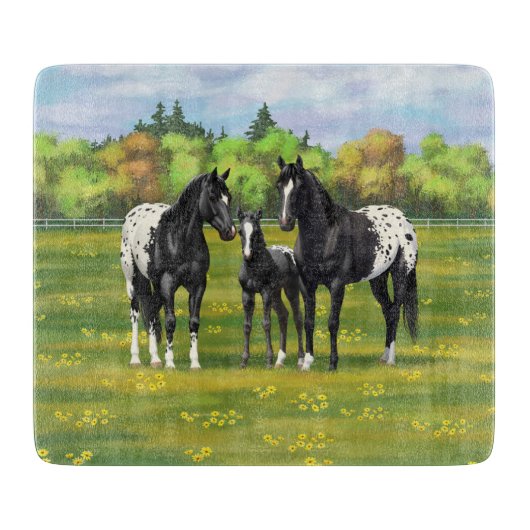 Zwarte appaloosa-paarden in de zomerperiode snijplank (Voorkant)