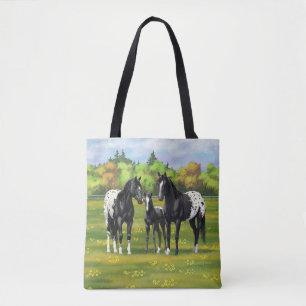 Zwarte appaloosa-paarden in de zomerperiode tote bag