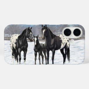 zwarte appaloosa-paarden in sneeuw iPhone 16 hoesje