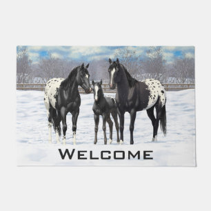 zwarte appaloosa-paarden in sneeuw deurmat