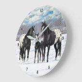 zwarte appaloosa-paarden in sneeuw grote klok (Hoek)