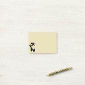 Zwarte balletschoenen en gekleurd post-it® notes (Op bureau)