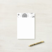 Zwarte barstpatronen op wit post-it® notes (Op bureau)