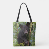 Zwarte beerwelp speelt in bomen tote bag (Achterkant)