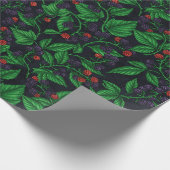 Zwarte bessen op donkergrijs cadeaupapier (Hoek)