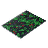 Zwarte bessen op donkergrijs notitieboek (Linkerzijde)