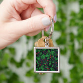 Zwarte bessen op donkergrijs sleutelhanger (Hand)