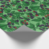 Zwarte bessen op groen cadeaupapier (Hoek)