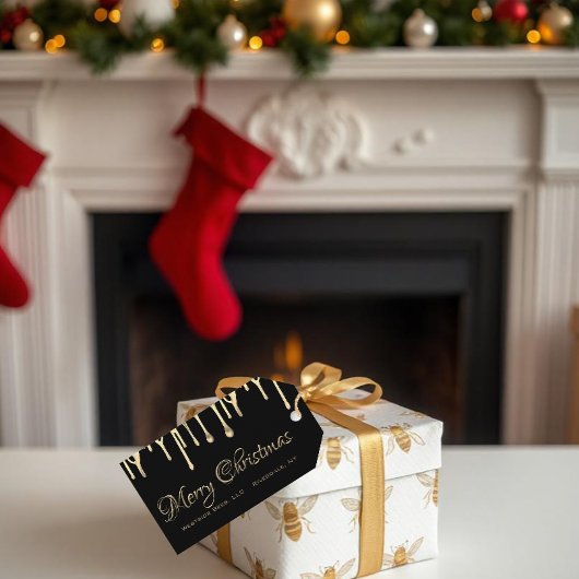 Zwarte bijenhoning met kerstmis-label gouddruppel cadeaulabel