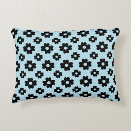 Zwarte bloem patroon op blauw accent kussen