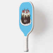 Zwarte boscake cartoon illustratie pickleball paddle (Links)