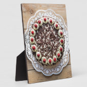 Zwarte boscake op bijthout fotoplaat (Zijkant)