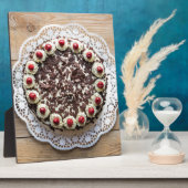 Zwarte boscake op bijthout fotoplaat (Zijkant)