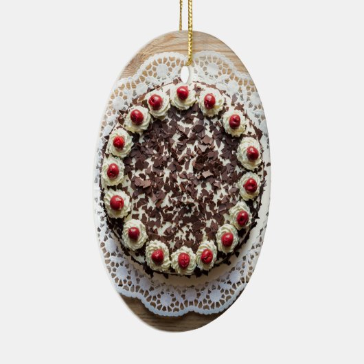 Zwarte boscake op bijthout keramisch ornament (Rechts)