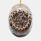 Zwarte boscake op bijthout keramisch ornament (Voorkant)