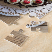 Zwarte boscake op bijthout legpuzzel (Zijkant)