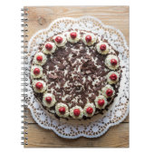 Zwarte boscake op bijthout notitieboek (Voorkant)