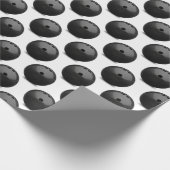 zwarte bowlingbal op wit cadeaupapier (Hoek)