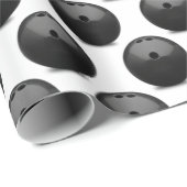 zwarte bowlingbal op wit cadeaupapier (Rol Hoek)