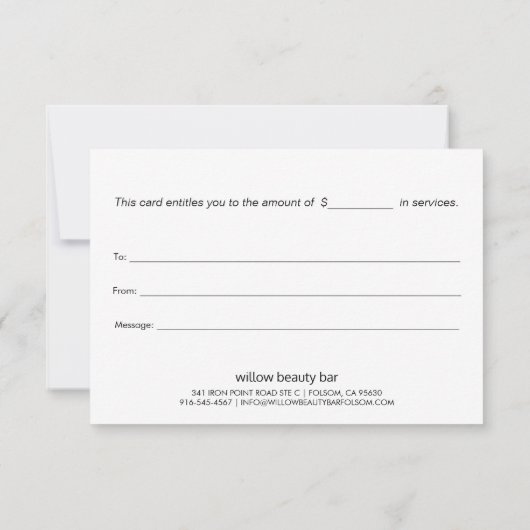 Zwarte cadeaubon uitnodiging met gouden rand (Achterkant)