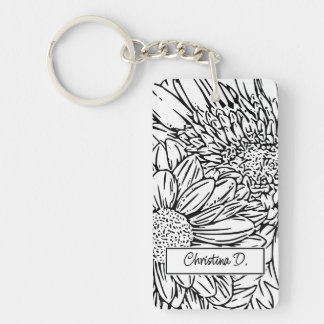 Zwarte chrysanten op witte achtergrond met foto sleutelhanger