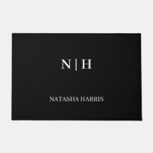 Zwarte deurmat met bedrijfslogo