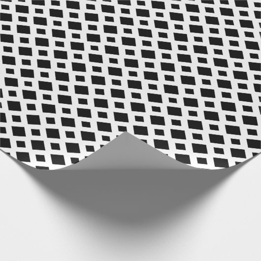 Zwarte diamanten op wit cadeaupapier (Hoek)