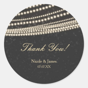 Zwarte donkere nachthemel- en slingerlichtstickers ronde sticker