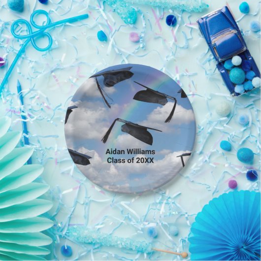 Zwarte dop in de lucht met regenboog papieren bordje (Feest)