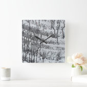 zwarte druppelaar op beton vierkante klok (Huis)