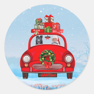 Zwarte Duitse Herdershond in auto met kerstman  Ronde Sticker
