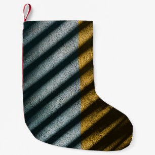 ZWARTE EN BROEIENDE GESRIPTE TEXTIEL KLEINE KERSTSOK