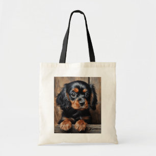 Zwarte en bruine Cavalier puppy Tote Bag
