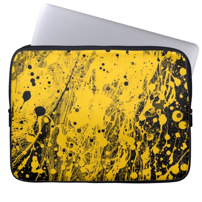 Zwarte en gele verfspatten laptop sleeve (Voorkant)