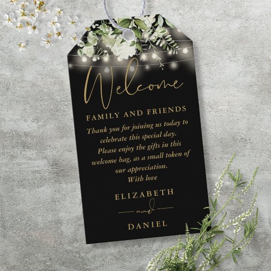 Zwarte en gouden cadeau-mandzak met groen cadeaulabel