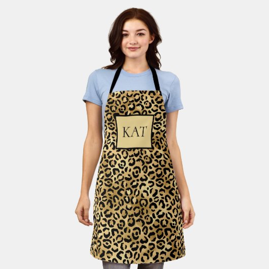 Zwarte en gouden luipaardprint met monogram cheeta schort (Gedragen)