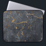 Zwarte en gouden luxe marmertextuur laptop sleeve<br><div class="desc">Zwarte en goudluxe faux marble afbeelding print.</div>
