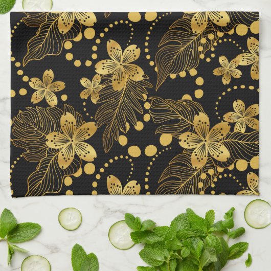 Zwarte en gouden tropische bladeren en bloesems theedoek (Gevouwen)