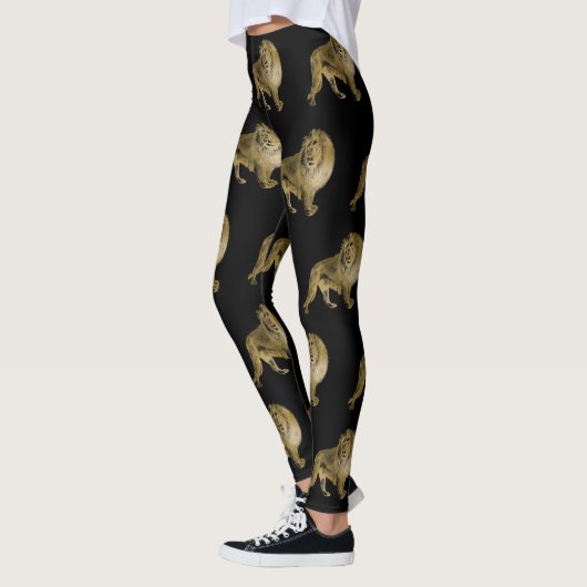 Zwarte en goudleeuwen leggings (Links)