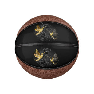 Zwarte en goudvogel basketbal