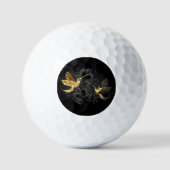 Zwarte en goudvogel golfballen (Voorkant)