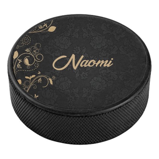 Zwarte en goudvogel hockey puck (3/4)