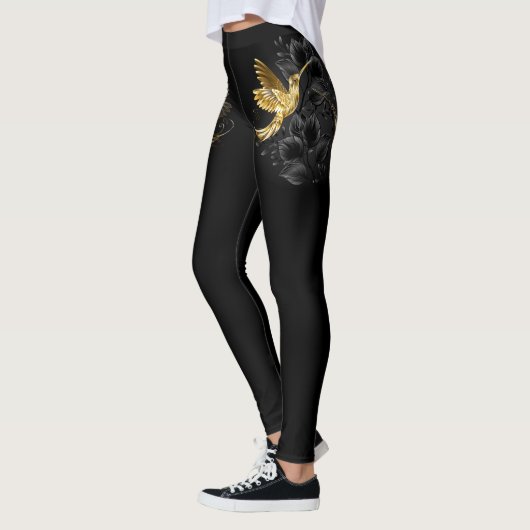 Zwarte en goudvogel leggings (Links)