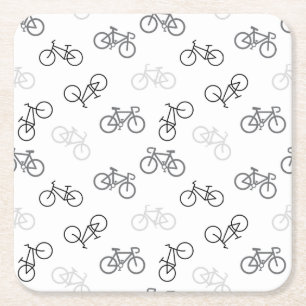 Zwarte en grijze fietsen kartonnen onderzetters