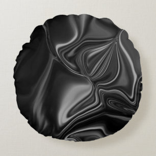 Zwarte en grijze gebogen lijnen op een donkere ach rond kussen