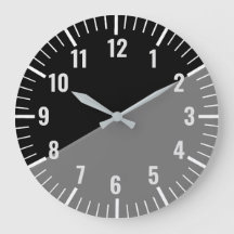 zwarte en grijze klok met cijfers