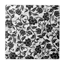 Zwarte en grijze wervelende bloemen