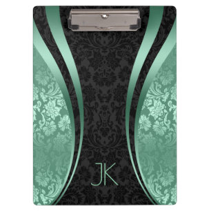 Zwarte en mint-groene geometrische platte maskers klembord