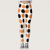 Zwarte en Oranje pokadots Leggings (Voorkant)