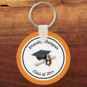 Zwarte en Oranje stuifmep en tassel Sleutelhanger (Voorkant)